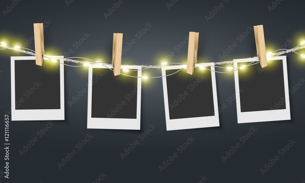 Blank photo frame hanging on rope with fairy lights Vector - obrazy, fototapety, plakaty 