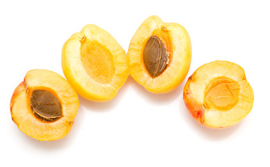 yellow apricots on a white background