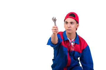 Wall Mural - Young repairman with wrench spanner isolated on white