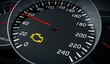 © vchalup - Engine malfunction warning light control in car dashboard. 3D rendered illustration.