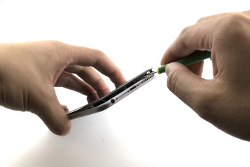 A man preparing to repair mobile phone.