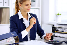 Modern Business Woman Or Confident Female Accountant In Office