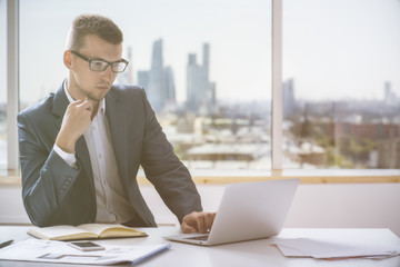 Poster - Concentrated businessman working on project