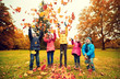 © Syda Productions - happy children playing with autumn leaves in park