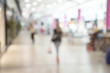 © gile68 - Blur store with bokeh background. Silhouettes of Business People