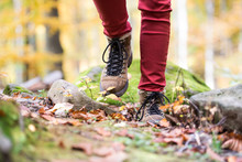 Close Up Of Legs Of Unrecognizable Woman In Autumn Nature