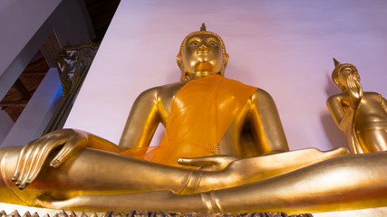 Buddha gold statue and thai art architecture in Wat Mahathat Yuwarat sa rit  temple in Thailand.