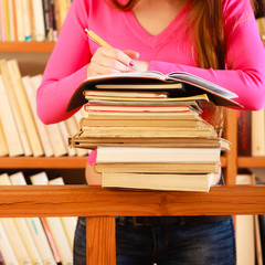 Wall Mural - Girl student in college library