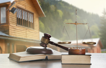 Gavel on blurred house background