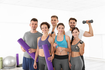 Canvas Print - Sport concept. Group of people in gym