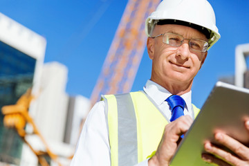 Wall Mural - Engineer builder at construction site