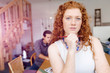 © Sergey Nivens - Young woman in office