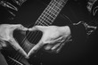 © princeoflove - music lover, male hand sign on acoustic guitar. bw filter