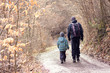 © Pavla Zakova - Father and son walking on forest road