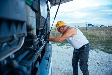 Wall Mural - Fixing a truck