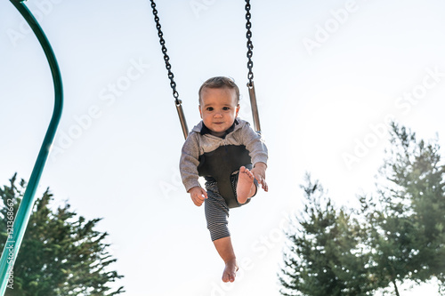 10 Month Old Baby Boy In Playground Swing Kaufen Sie