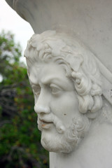 marble bas-relief in the form of ancient man face with beard on