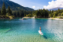 Girl On A Paddleboard On The Caumasee In Switzerland