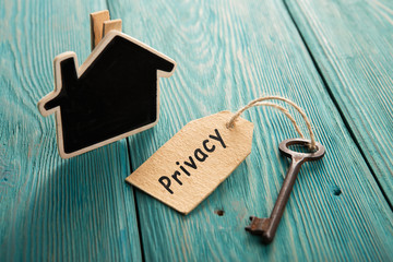 Wall Mural - privacy concept - vintage key with tag with inscription