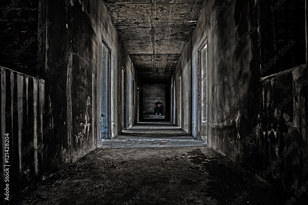 some people sitting in the room at end of scary hallway walkway in abandoned building - obrazy, fototapety, plakaty 
