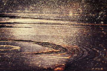 Canvas Print - wooden textured background with colden glitter. christmas frame background