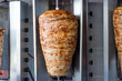 Gyros - Skewered fast food, slices of a pork meat on a skewer