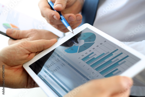 Fotografía Business colleagues working and analyzing financial figures on a