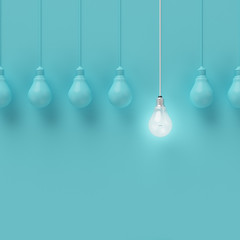 hanging light bulbs with glowing one different idea on light blue background , minimal concept idea 