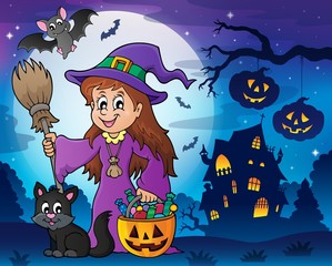 Wall Mural - Cute witch and cat in Halloween scenery