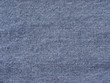 © srckomkrit - Texture of blue jeans textile close up