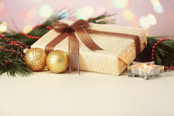 Wall Mural - Christmas balls and present on white table