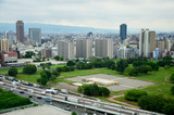 Fototapeta Londyn - Aerial view cityscape of Osaka city at around Osaka castle