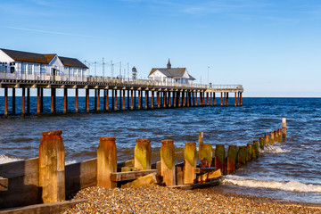 Wall Mural - Wooden Groynes and Pier at Southwold Beach, UK