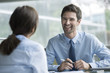 © PhotoAlto - Manager interviewing job candidate