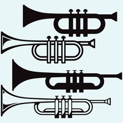 Wall Mural - Trumpet, musical instrument. Isolated on blue background. Vector silhouettes