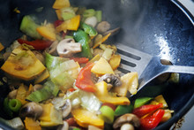 Stir Fry Cooking, Blurred, Bright, Sizzling And Steamy.