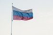 Russian tricoloured flag waving in the wind