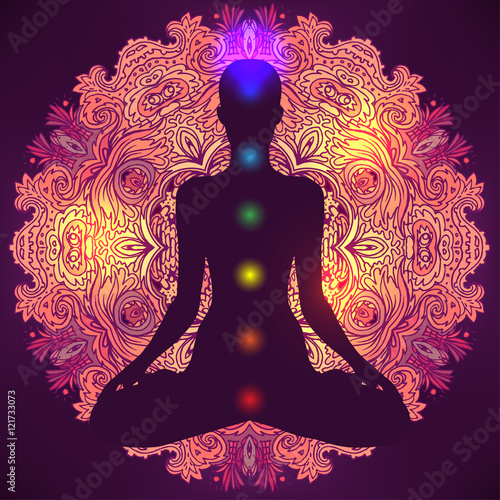 Fotografie, Obraz Woman ornate silhouette sitting in lotus pose. Meditation, aura