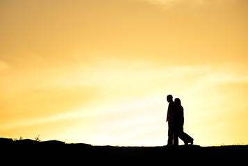 Couple walking silhouette