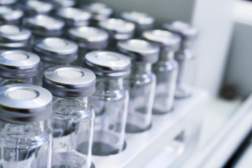 Glass vials for liquid samples.