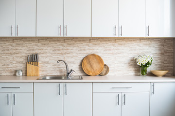 interior of new bright white home kitchen