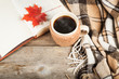 Hot coffee in a large cup, book, maple leaf, plaid