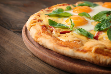 Sticker - Margarita pizza with basil leaves and egg on wooden background