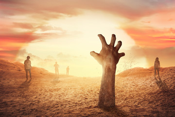 Canvas Print - Zombie hand rising from the grave