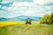 © Volodymyr - Farm tractor drives on road