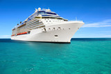 Fototapeta  - Luxury cruise ship sailing to port on sunny day