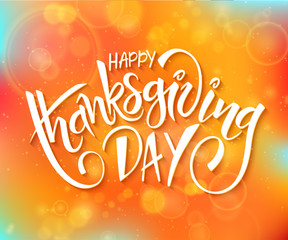 Wall Mural - vector thanksgiving day greeting lettering phrase - happy thanksgiving day - on blur autumn background with flares