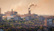 Steel mill, Metallurgy plant at sunset. Heavy industry factory. Steel factory with smog. Pipes with smoke. Metallurgical plant. steel, iron works. Ecology problems, atmospheric pollutants. Buildings