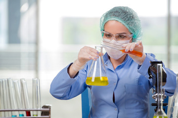 Woman chemist working in the lab