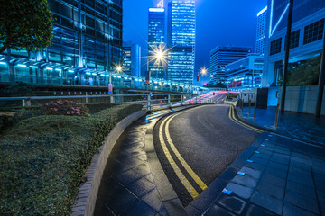 Poster - urban road and modern buildings at night,hong kong,china.